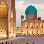 Decorative tiled architecture and a dome at the Registan in Samarkand
