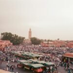 Stalls and people gathering in Jemaa el Fnaa in Marrakech