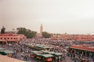 Stalls and people gathering in Jemaa el Fnaa in Marrakech