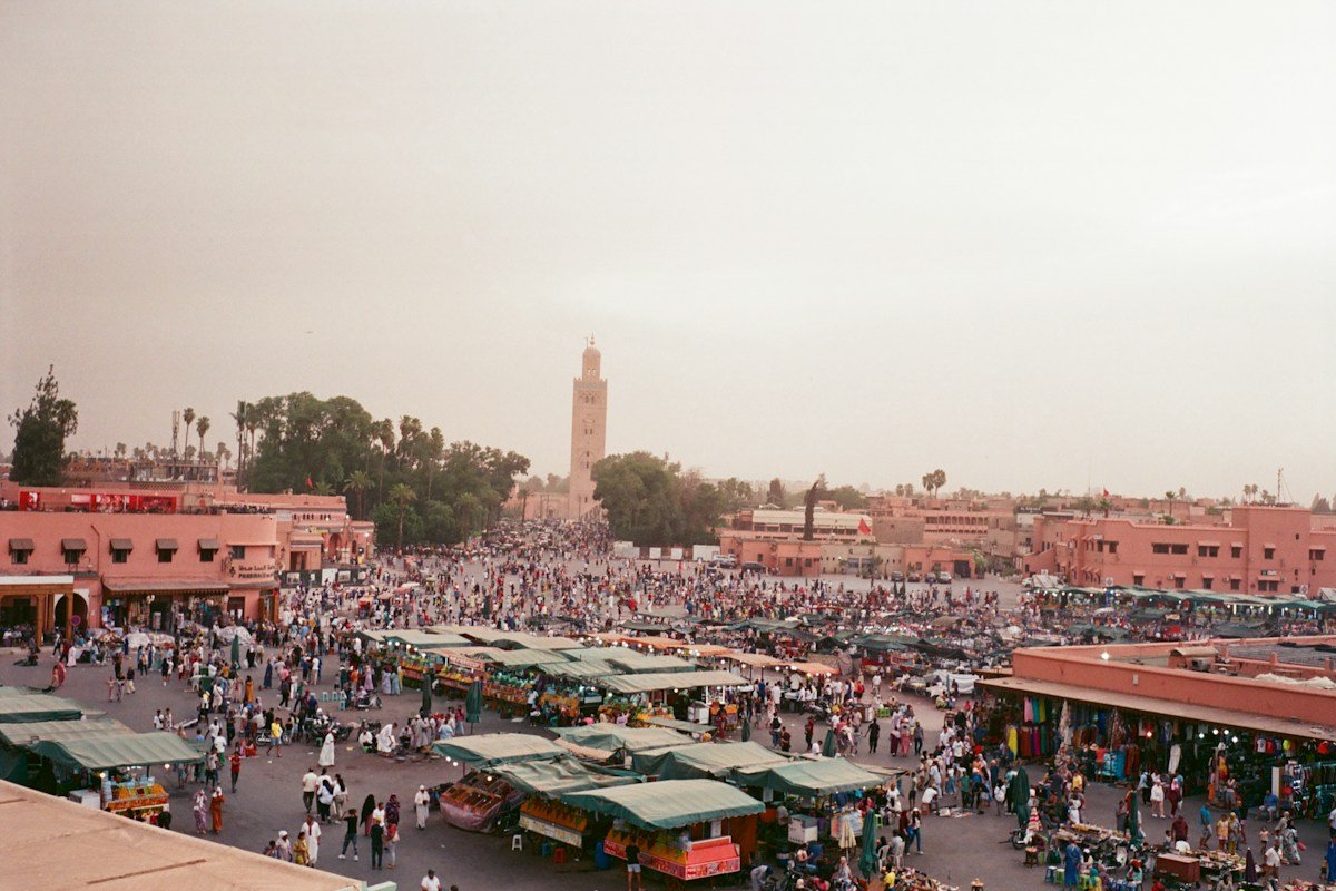 Stalls and people gathering in Jemaa el Fnaa in Marrakech